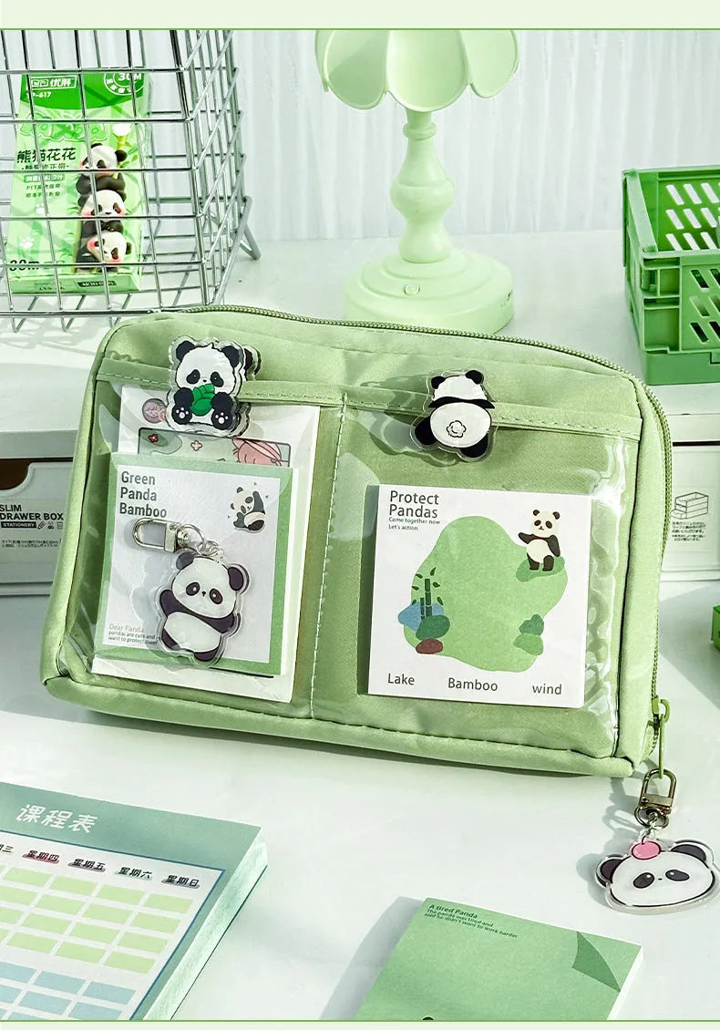 Green canvas panda pencil case with 12 internal storage layers for stationery organisation.