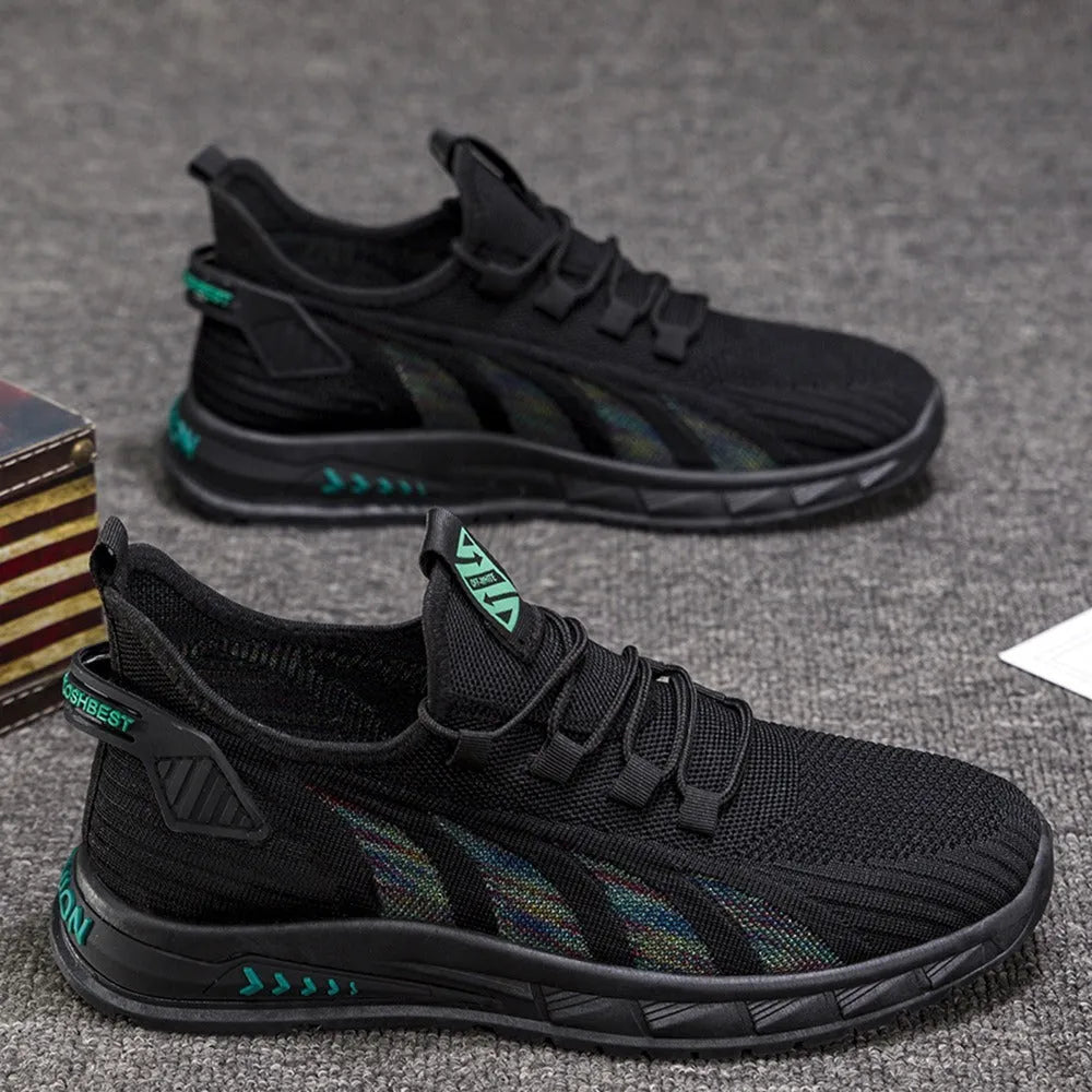 Lightweight low-top sneaker in mesh with stripe pattern and flat plastic sole.