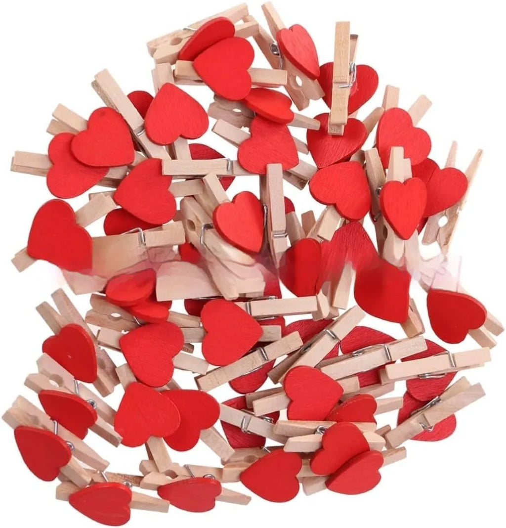 Five handmade solid wood heart-shaped clips in white, red, pink, rose, and yellow.