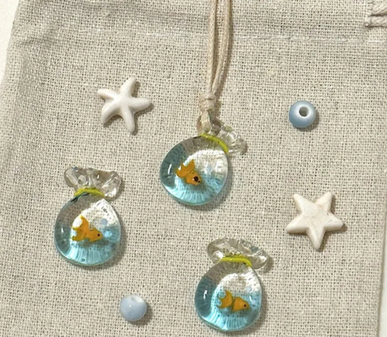 Women's necklace with a coloured glaze Skirt Everyday Joker pendant on a cotton and linen clavicle chain.