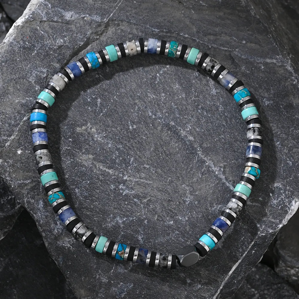 Bohemian cylindrical bracelet with hand-woven semi-precious stones in geometric design