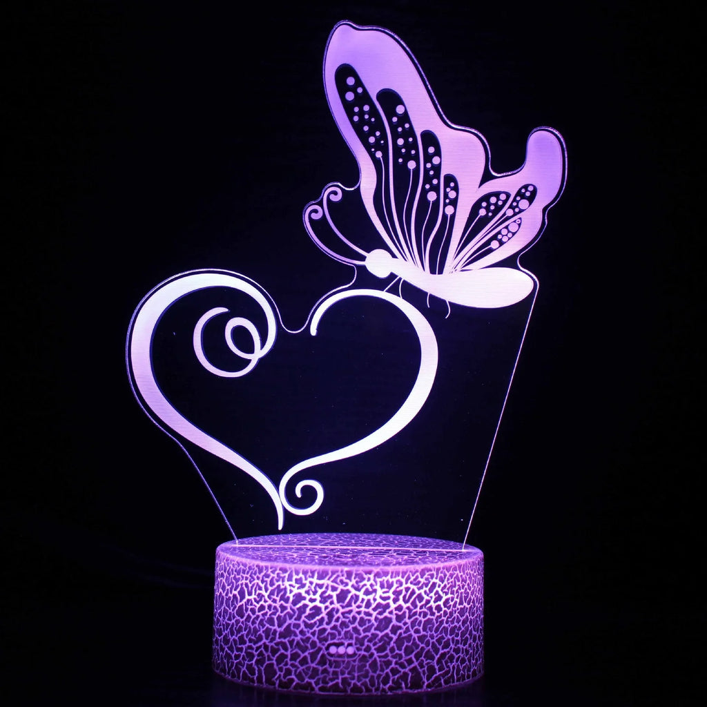 Small acrylic 3D USB table lamp with colourful glow on a rectangular black ABS base, showing touch controls.