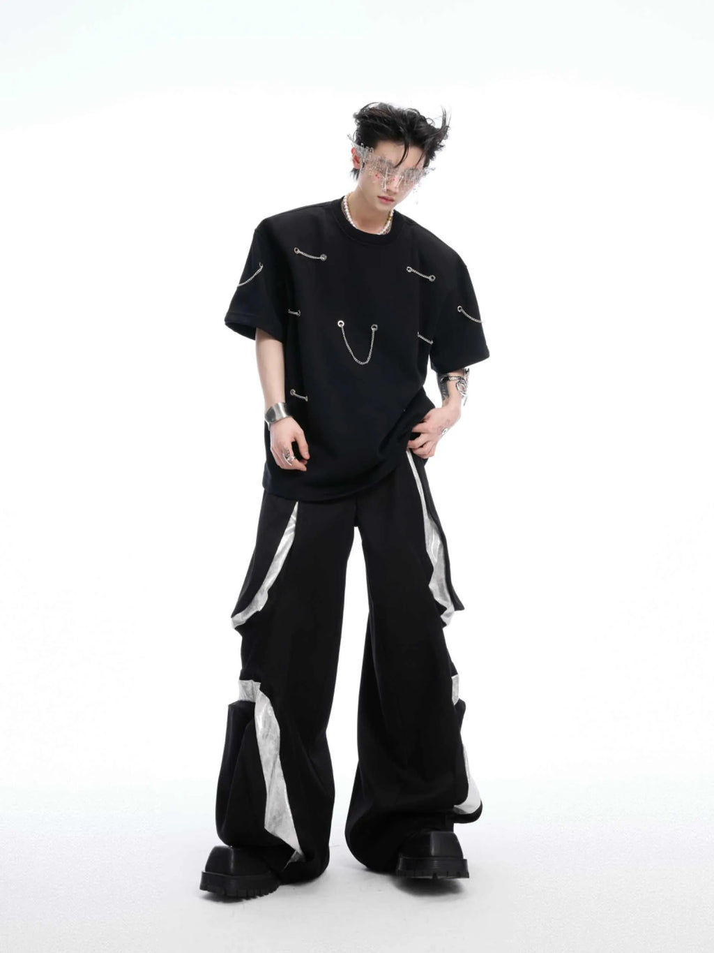 Black men's T-shirt with padded shoulders and metal chain detail, short sleeves, round neck
