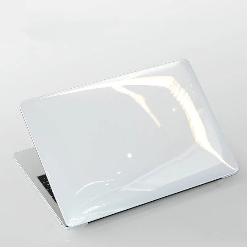 Transparent and black PC hard protective shell case for Apple MacBook Pro 14-inch and 16-inch laptops.