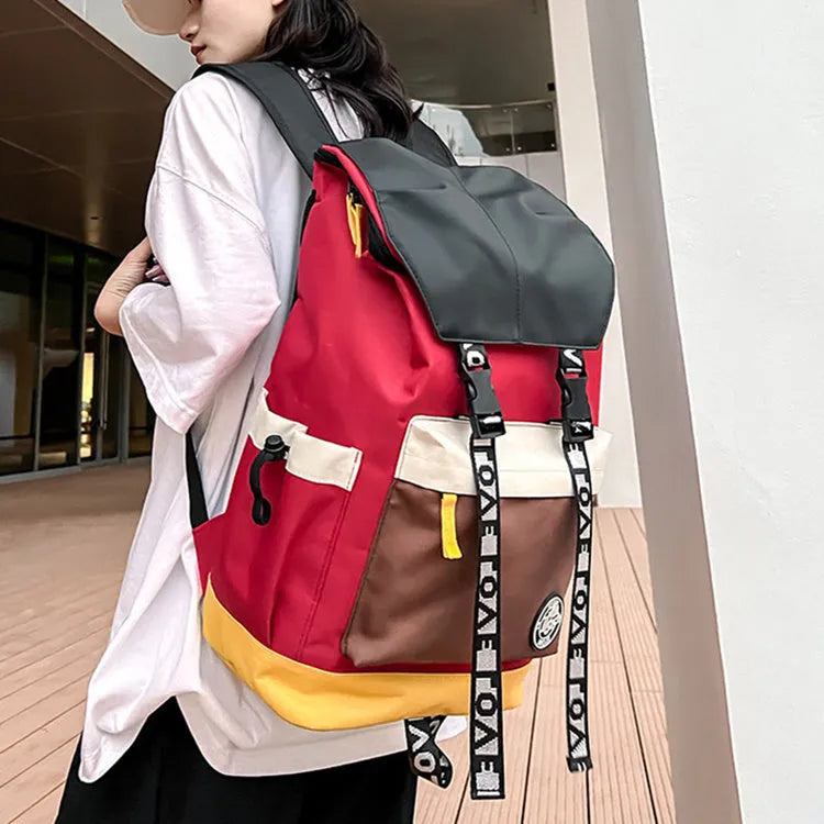 Oxford cloth backpack in black, green, or red colours showing handheld and shoulder straps.
