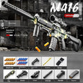 M416 toy soft bullet gun in sand colour with manual bolt throwing shell, plastic construction, includes accessories.