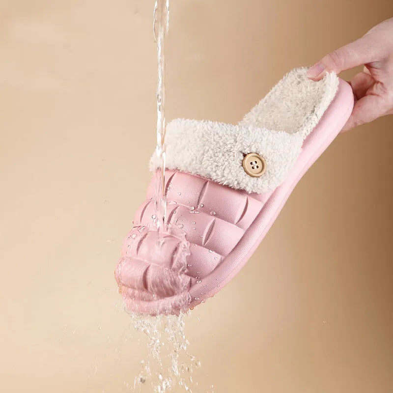 Plaid-patterned detachable women's house slippers with a plush lining and a light-coloured EVA sole.