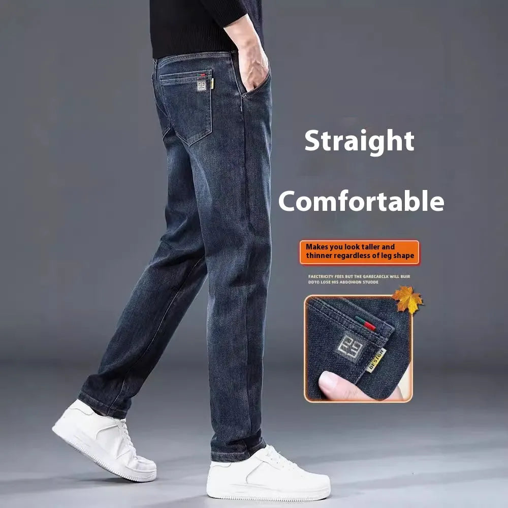 Blue grey slim straight loose casual trousers on a hanger, showing mid waist and zipper fly.