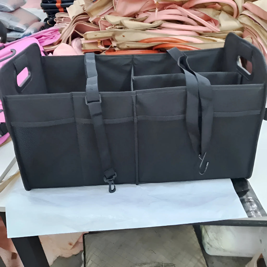 Foldable multi-compartment car boot storage box in black fabric with handle