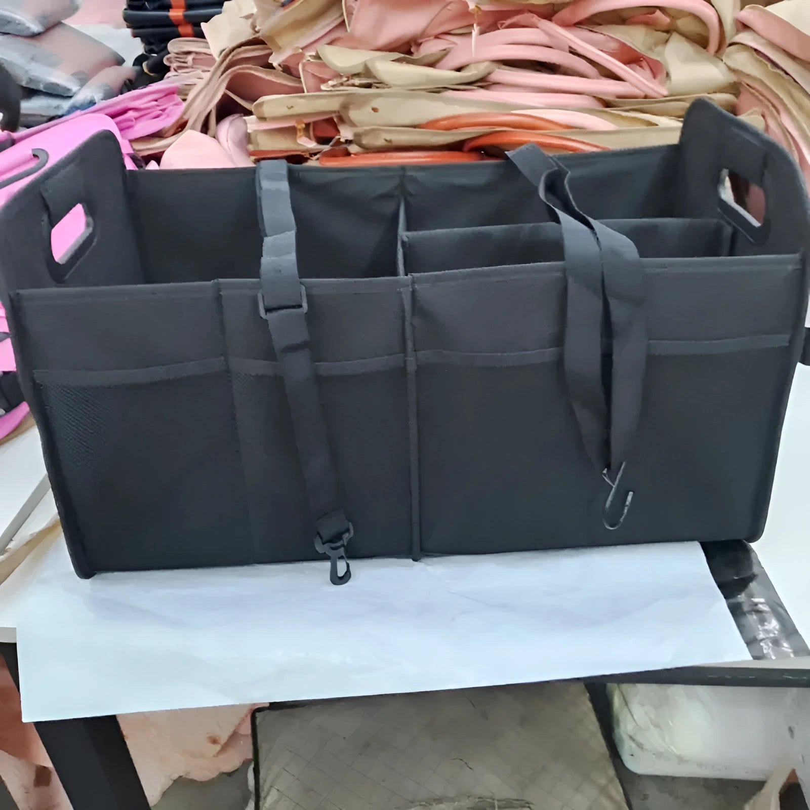 Foldable multi-compartment car boot storage box in black fabric with handle