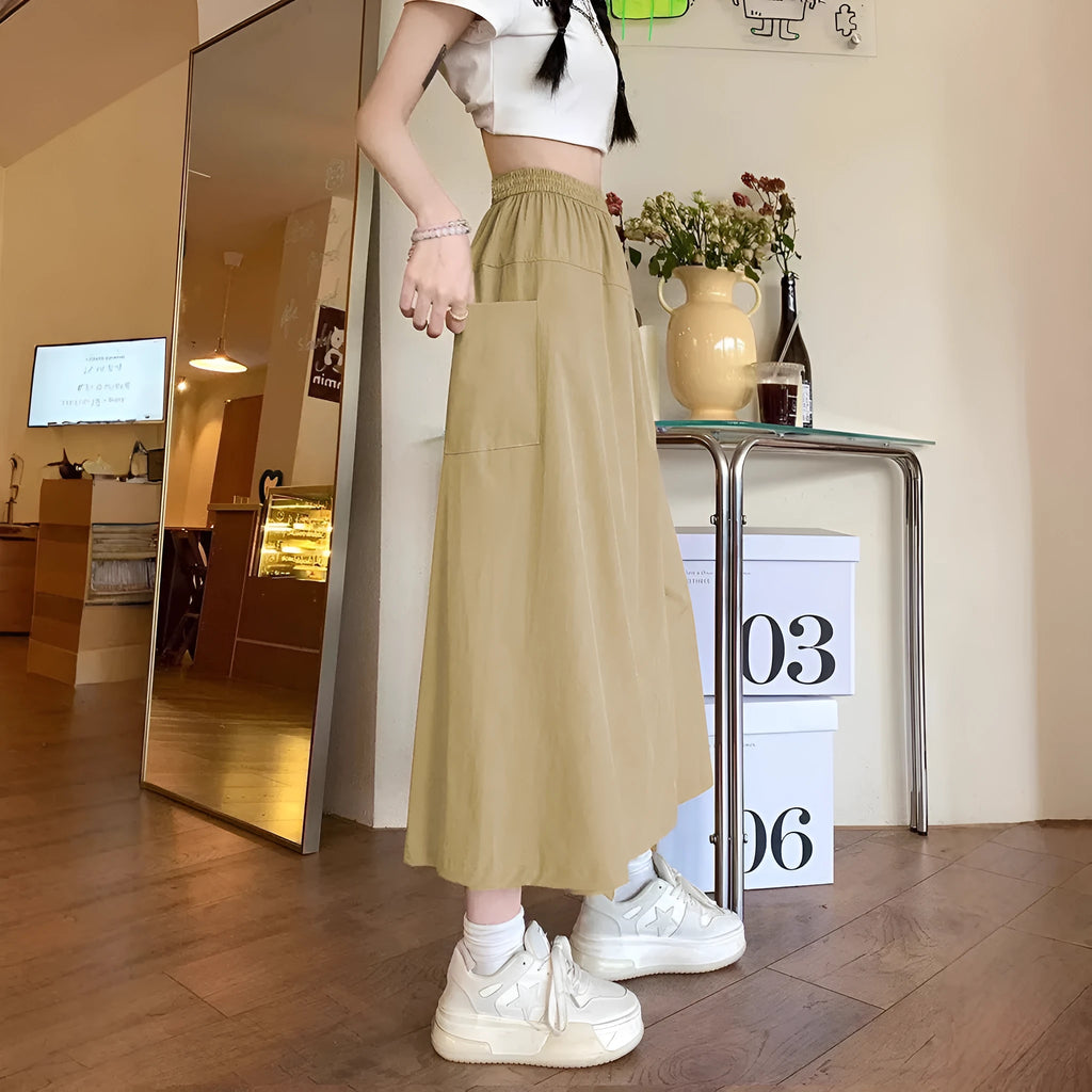 Camel coloured women's wide leg skirt with elastic waist and drape detailing