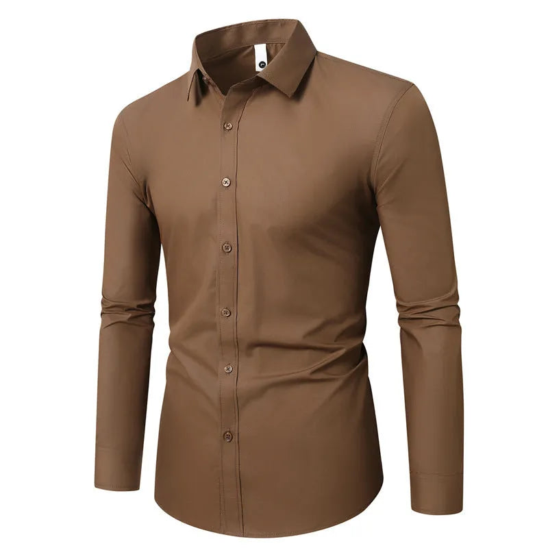 Man wearing a loose-fit long-sleeve linen shirt in a neutral colour.