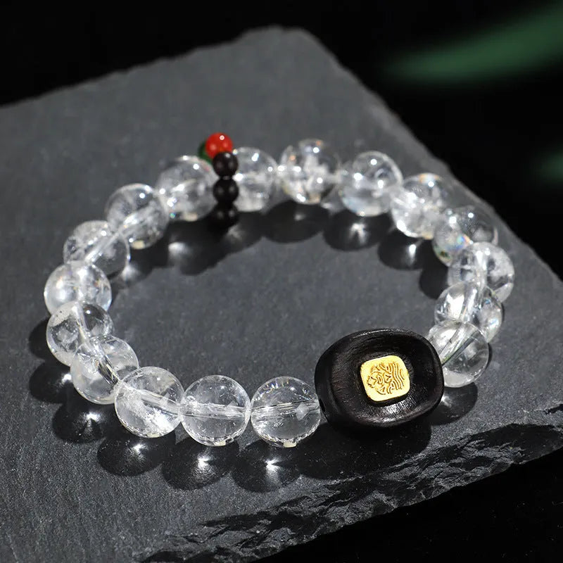 Natural white crystal ebony five warp bracelet on wrist showing handmade ethnic design