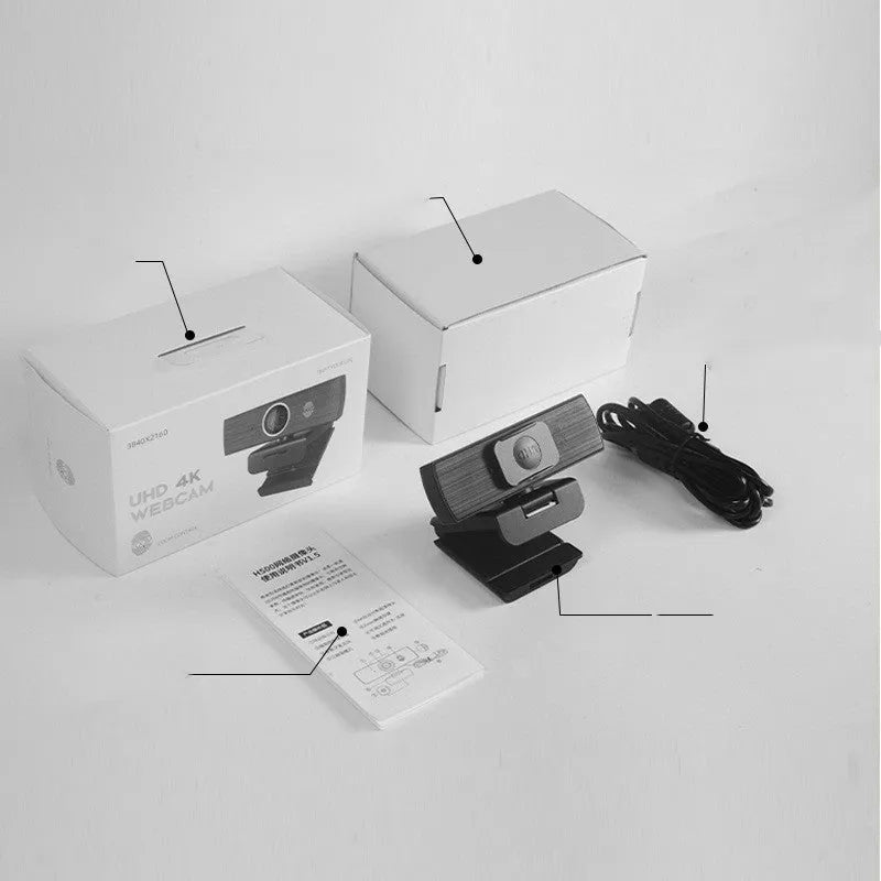 Black USB computer webcam with magnetic privacy cover shown detached