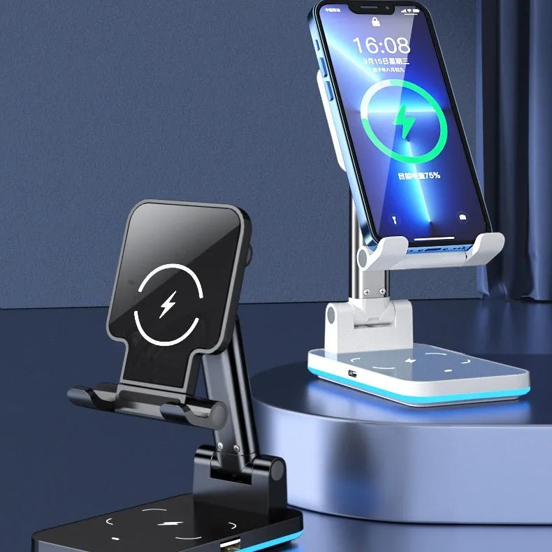 Cool black desktop phone stand with integrated Qi wireless charging pad on a wooden desk.