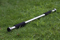 Steel adjustable width pull-up bar mounted in a door frame for home fitness