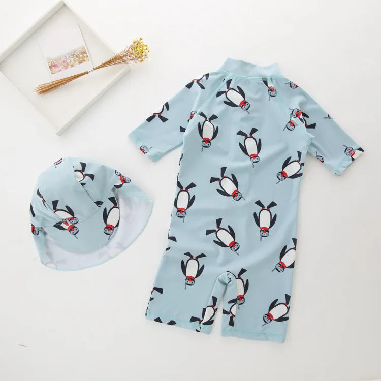 Boy's penguin print long sleeve one-piece swimsuit with matching swimming cap set
