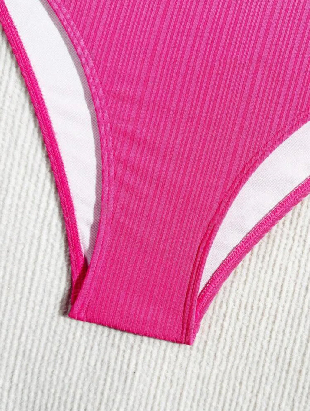 Black women's halter bikini with lace-up front detail and matching briefs.