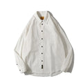 Men's loose fitting pure colour cotton cardigan shirt on a hanger, showing short sleeve and long sleeve style options.