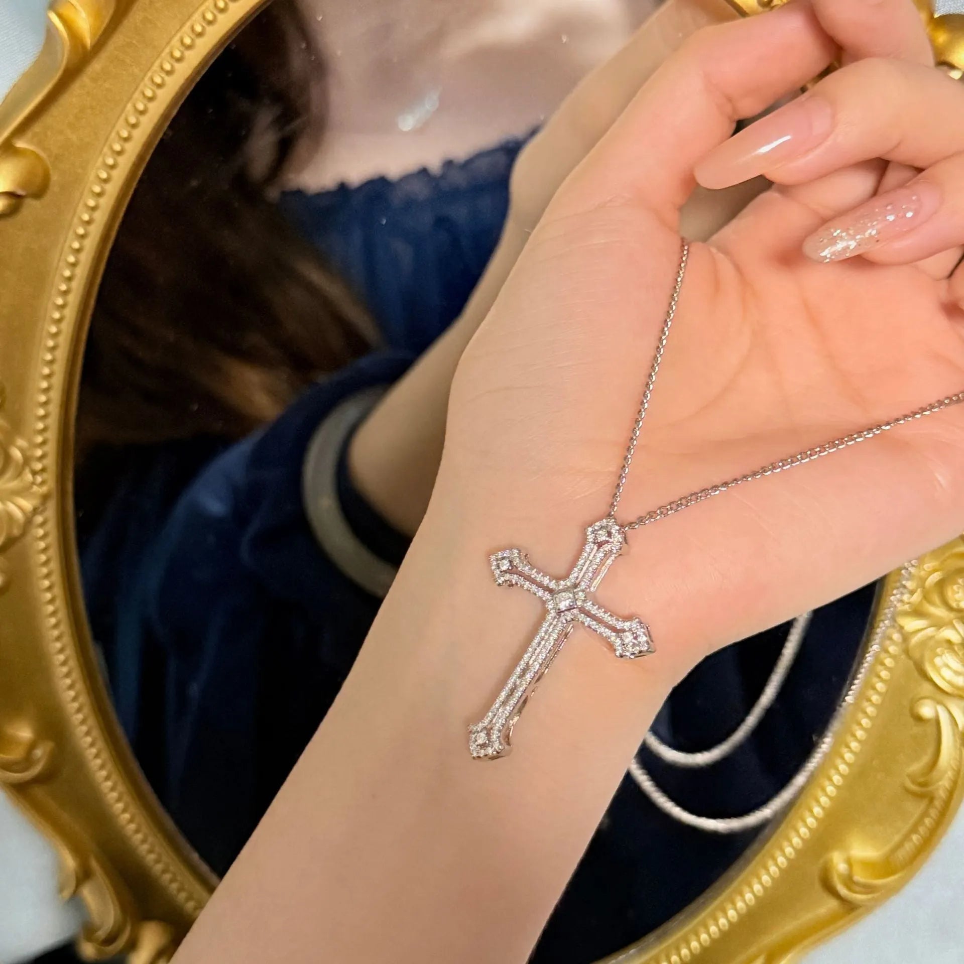 Copper geometric cross necklace with electroplated finish on women's neck