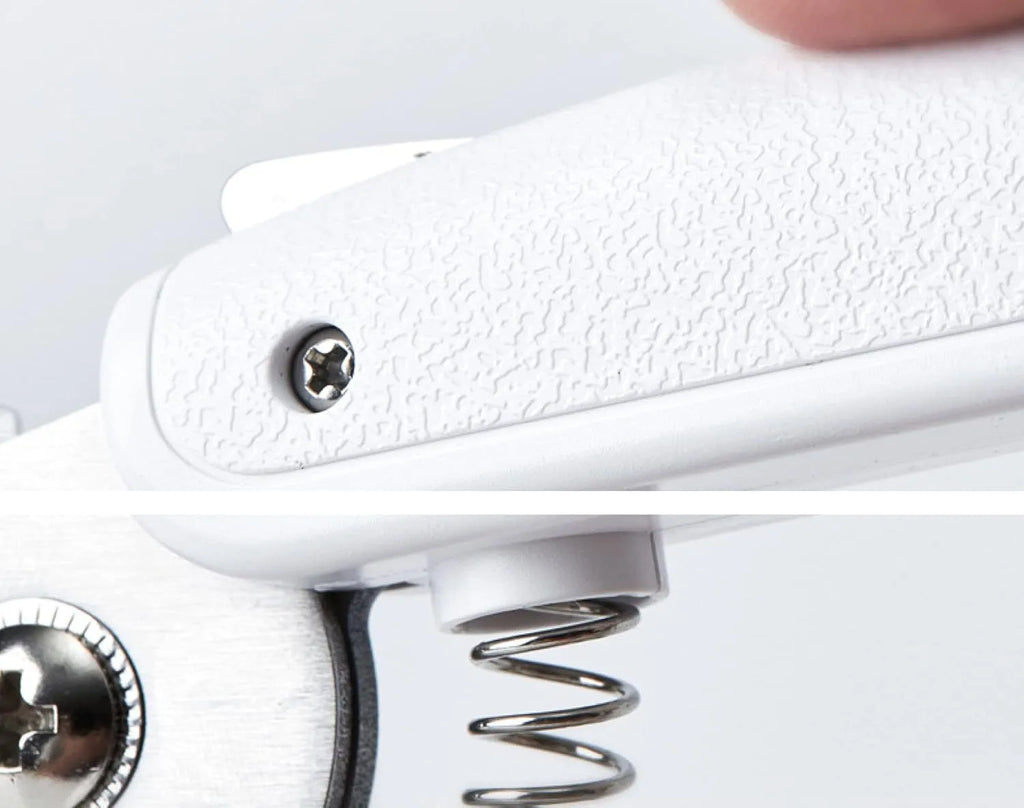 White pet nail clippers with LED light, transparent guard, and built-in file for cats and dogs.