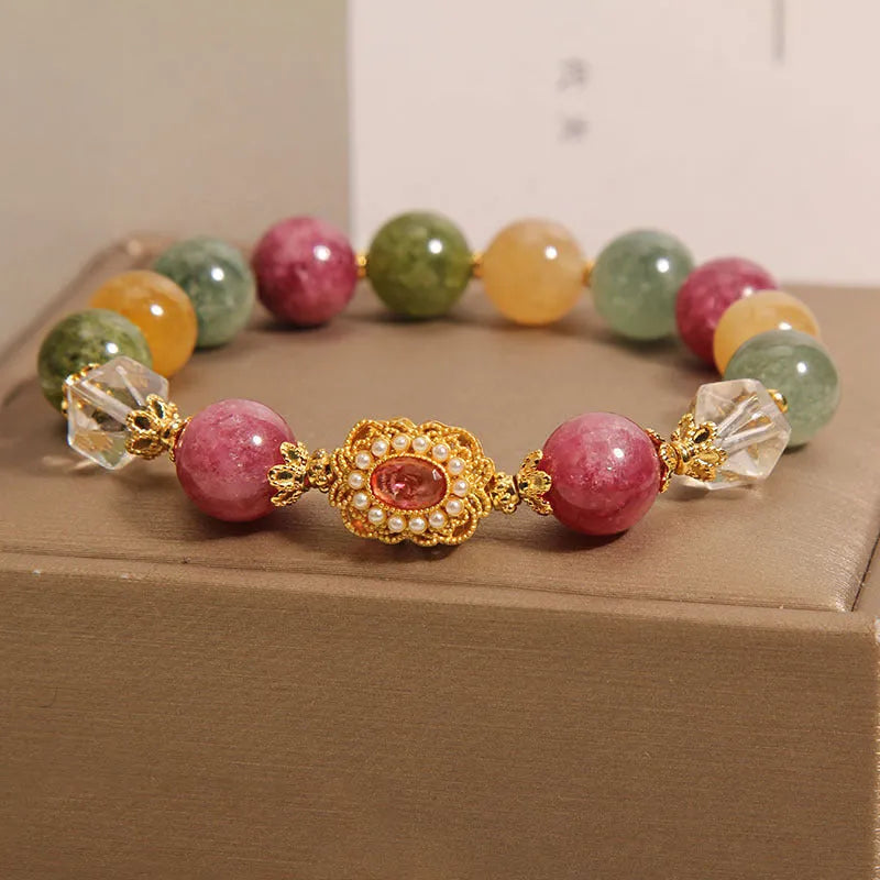 Women's jade colour tourmaline alloy bracelet with round beads on pearl crystal base and rhinestone accents