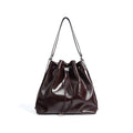 Genuine leather one-shoulder bucket bag in retro style with multiple internal compartments