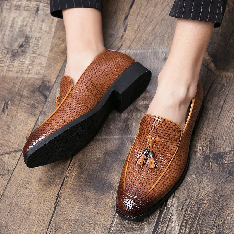 Men's black pointed toe slip-on shoes with tassel detail for business wear