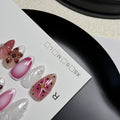 Hand-painted 3D carved nail art patches with embossed candy pattern on an Almond-shaped nail.