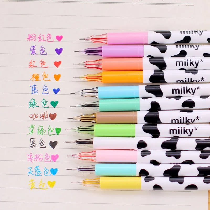 Box of 12 cow print gel pens with 0.38mm fine tips in assorted colours.