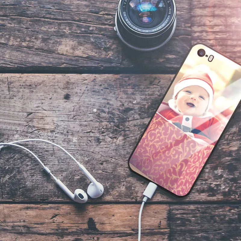 Patterned hard iPhone case with raised edge around camera lens on a table