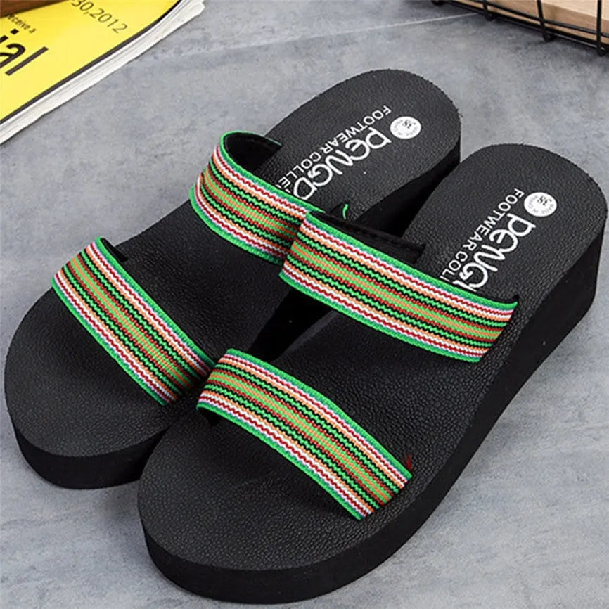Women's brown bohemian summer slippers with elastic upper and rubber sole on a light background