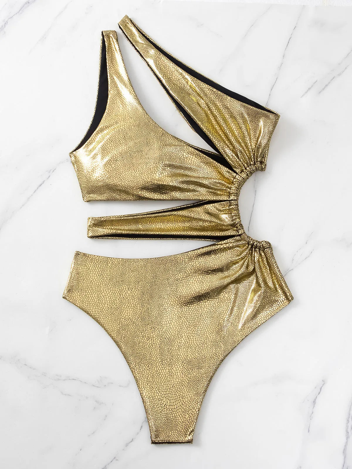 Women's gold backless one-piece swimsuit with Spandex lining shown in sizes S, M, L