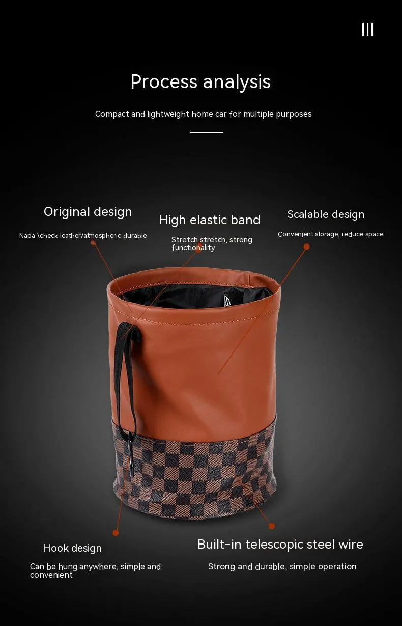 Brown leather folding interior trash can with a retractable handle, shown unfolded.