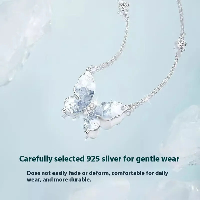 Close-up of a silver Bingyu Butterfly necklace with an ice rain pendant on an adjustable O-ring chain.