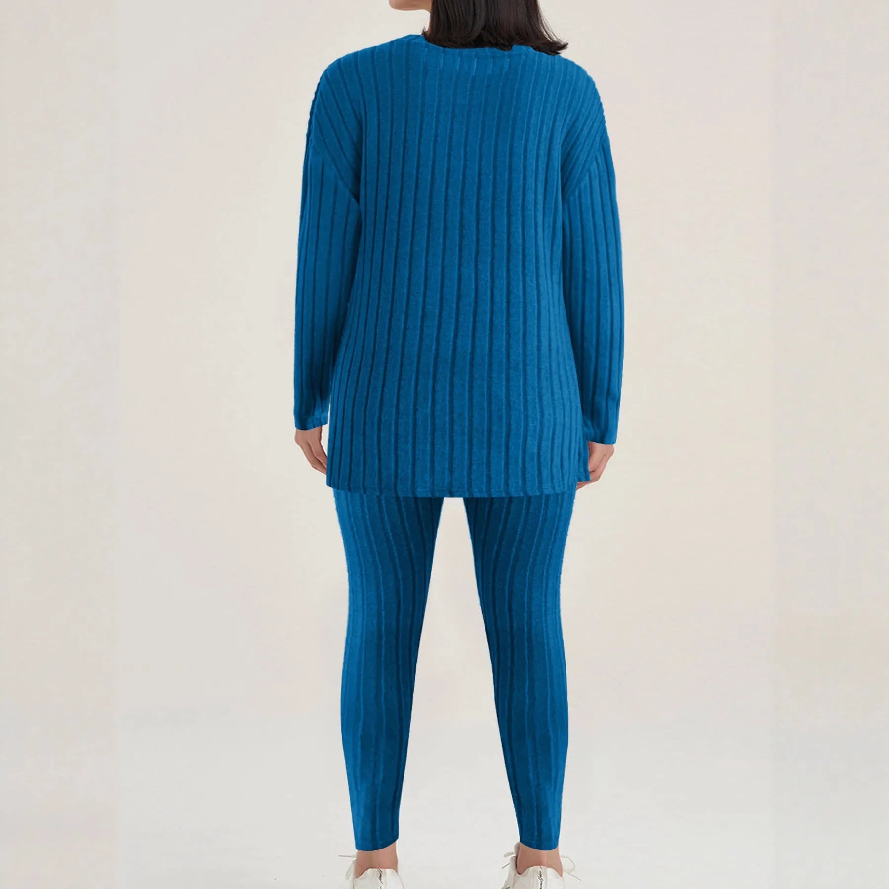 Sunken stripe black polyester two-piece homewear set showing trousers and top on Asian size mannequin