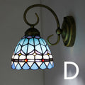 Coloured stained glass corridor wall lamp in one of six available design styles.