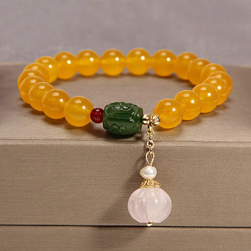Yellow agate crystal bracelet with gold silk threading for women in khaki colour