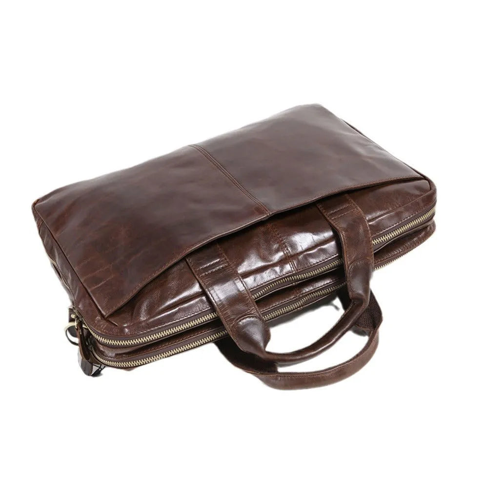 Brown leather men's business briefcase with 18-inch size and first layer cowhide construction