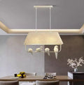 Bird chandelier ceiling lamp with iron frame and fabric shade in dining room setting