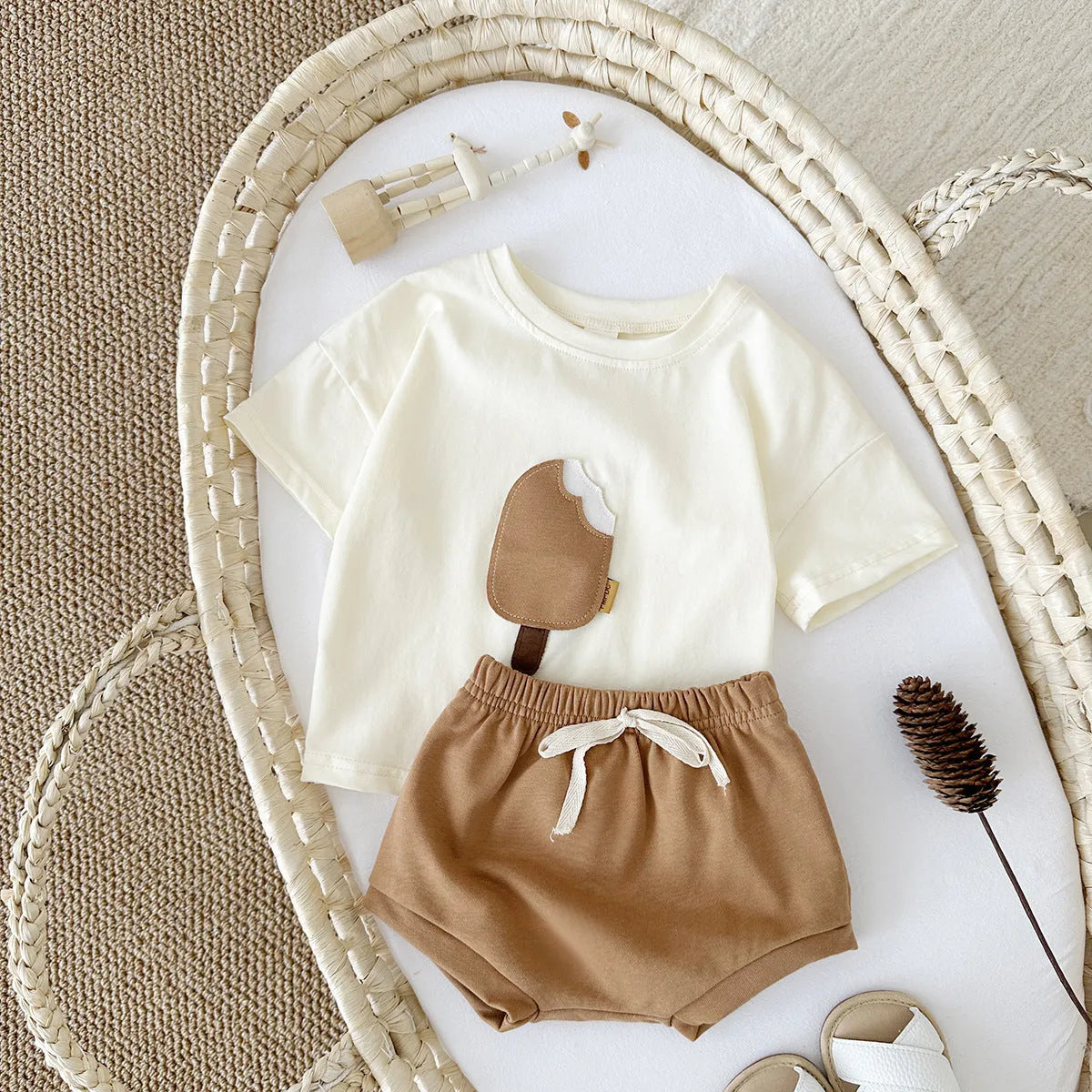 Girls' apricot coloured cotton shorts suit set with ice cream patch, short sleeves and round neck.