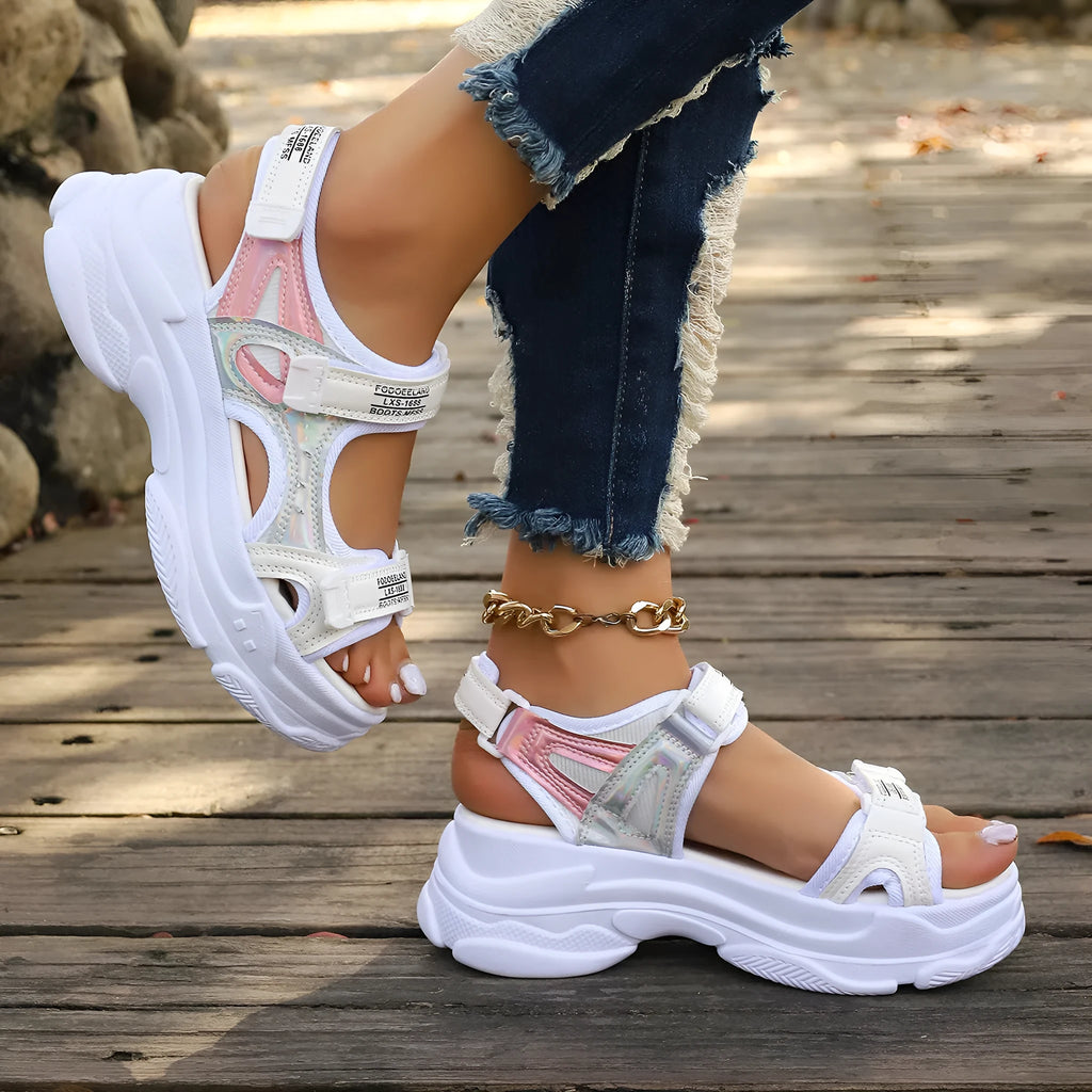 Women's black Roman platform sandals with adjustable straps and rubber soles