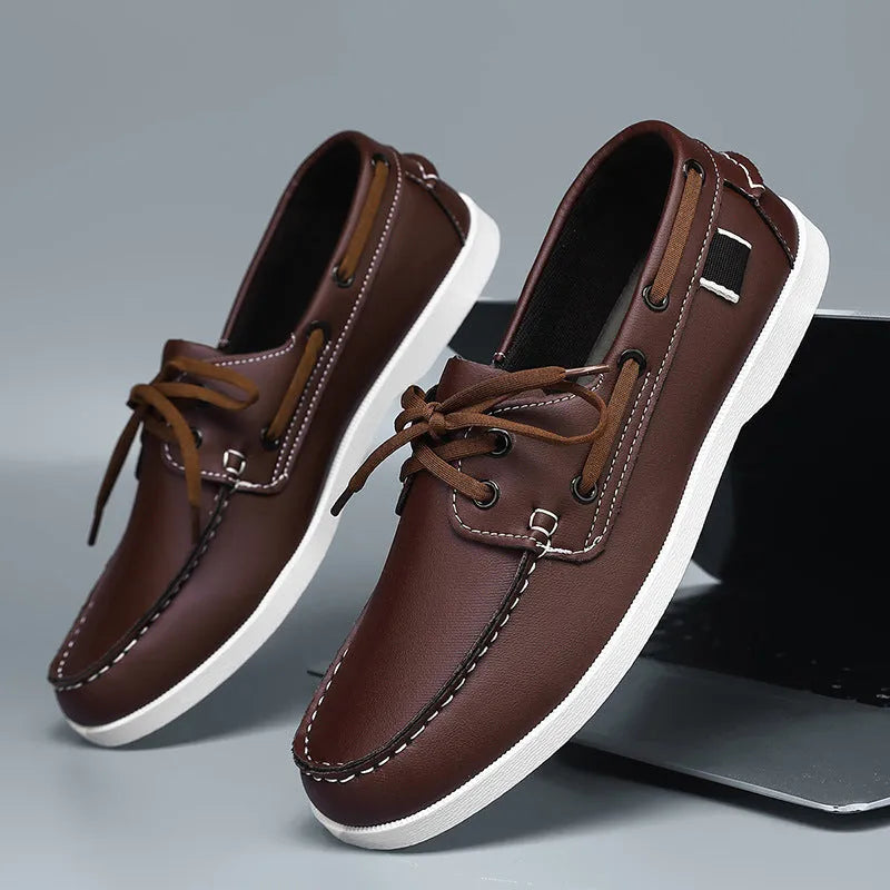 Men's British style casual shoe with round toe and flat heel, shown in a solid colour.