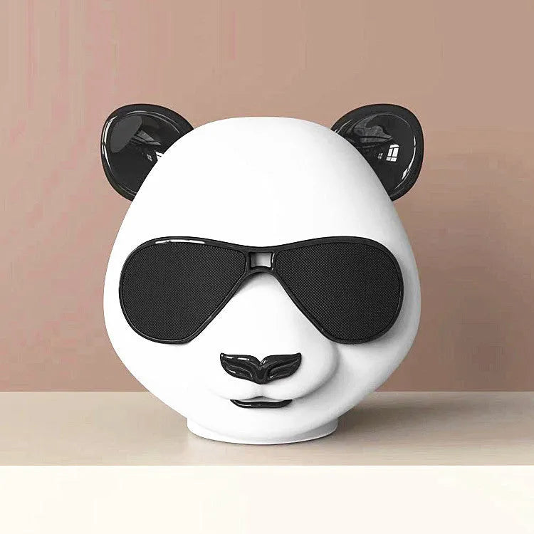 Classic style portable mini Bluetooth speaker showing front grill and likely control buttons.