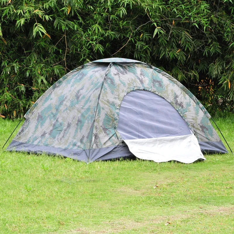 Green and brown camouflage pattern two-person camping tent with mesh windows, shown pitched outdoors.