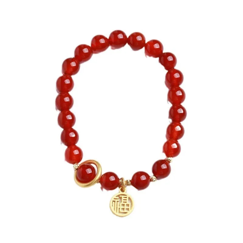 Handwoven natural red agate beaded bracelet with cultural style, shown with a blessing card.