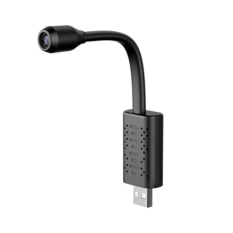 Small black V380 wireless USB security camera shown next to a microSD card.