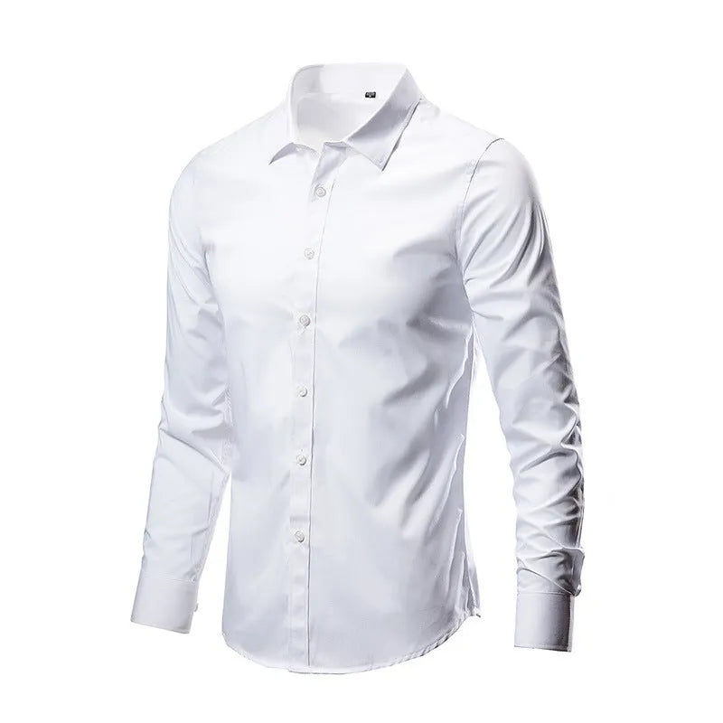 Man wearing a loose-fit long-sleeve linen shirt in a neutral colour.