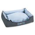 Soft grey dog bed with removable cover in small, medium, and large sizes.