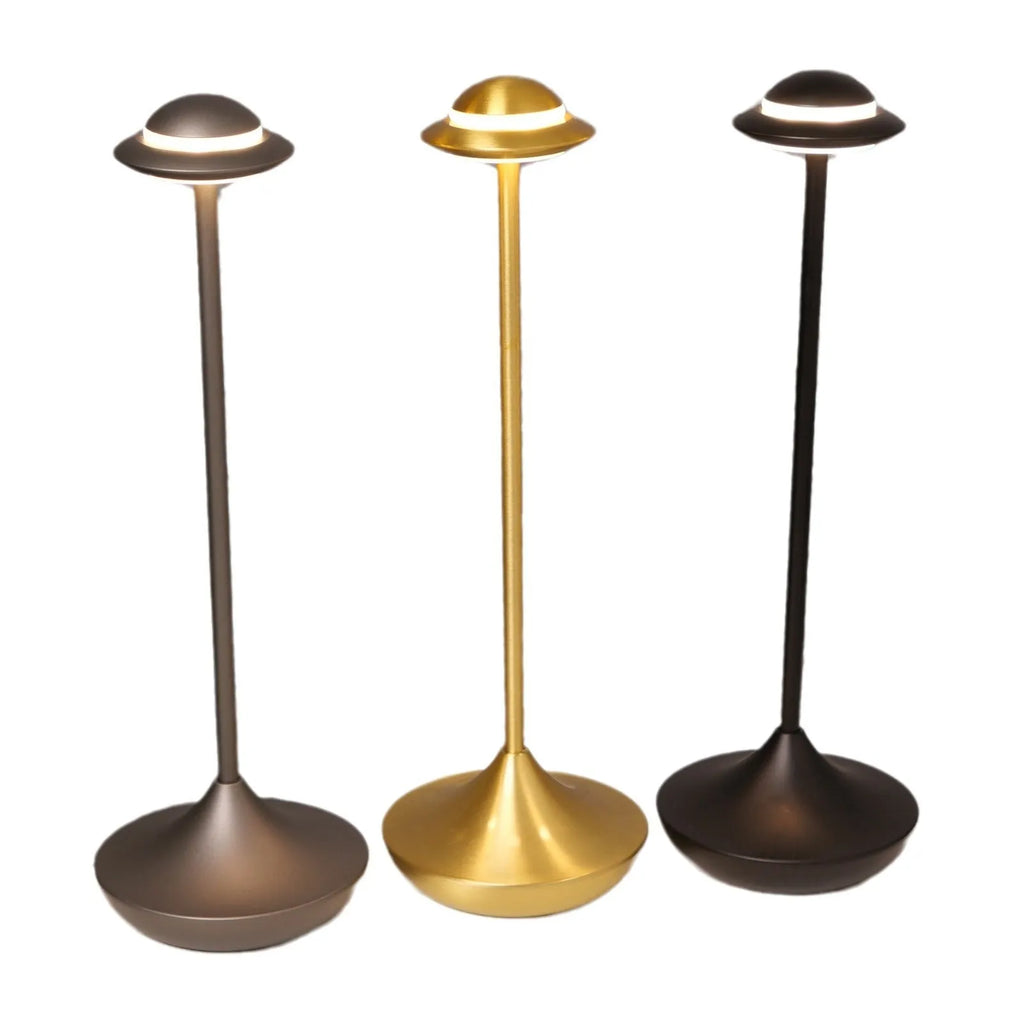 Modern metallic UFO-shaped table lamp with touch controls in black, gold, or grey finish.